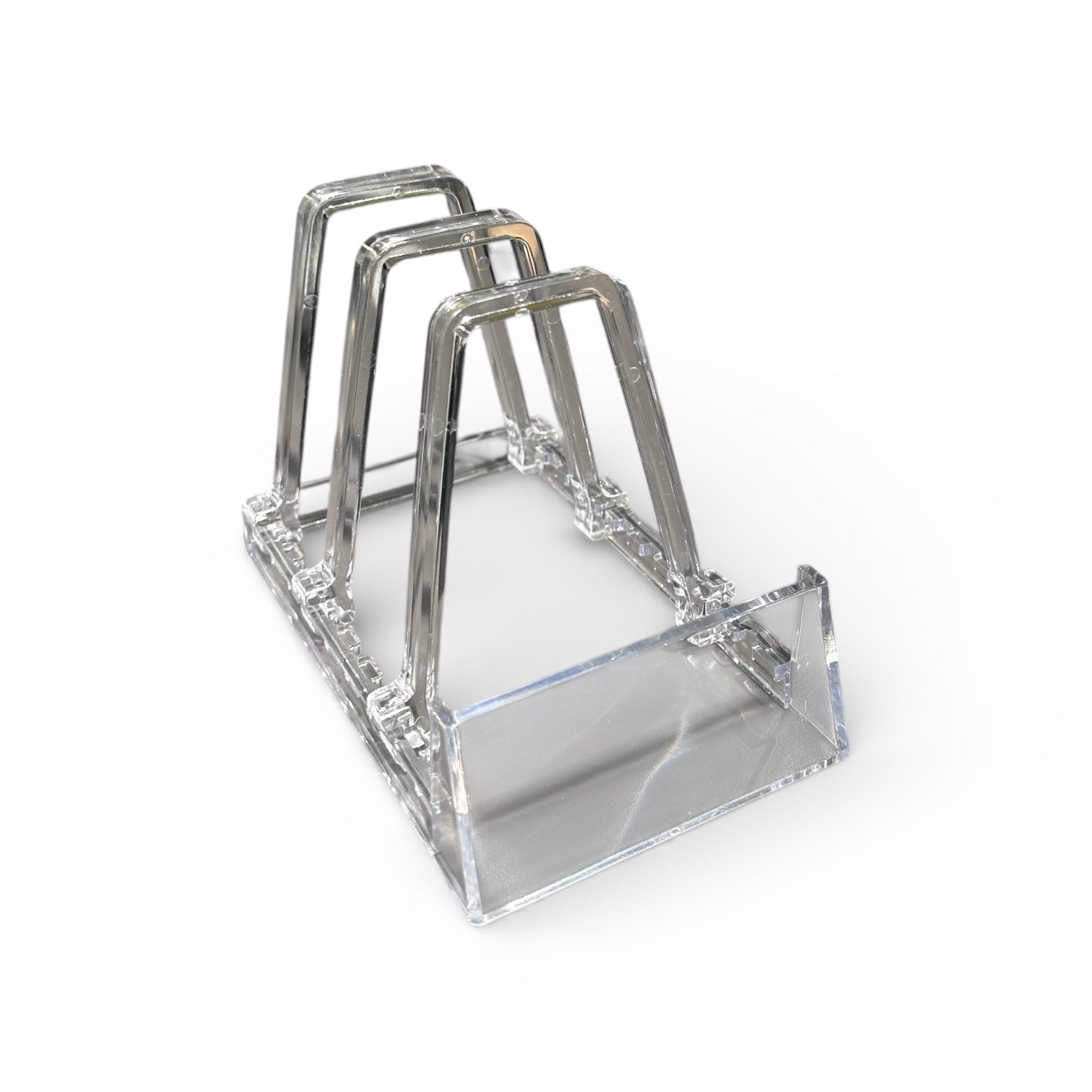 Stoð fyrir 3 stk. bók/skálar, glær, H11,5cm